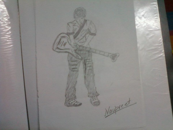 Pencil Sketch Of A Guitar Boy